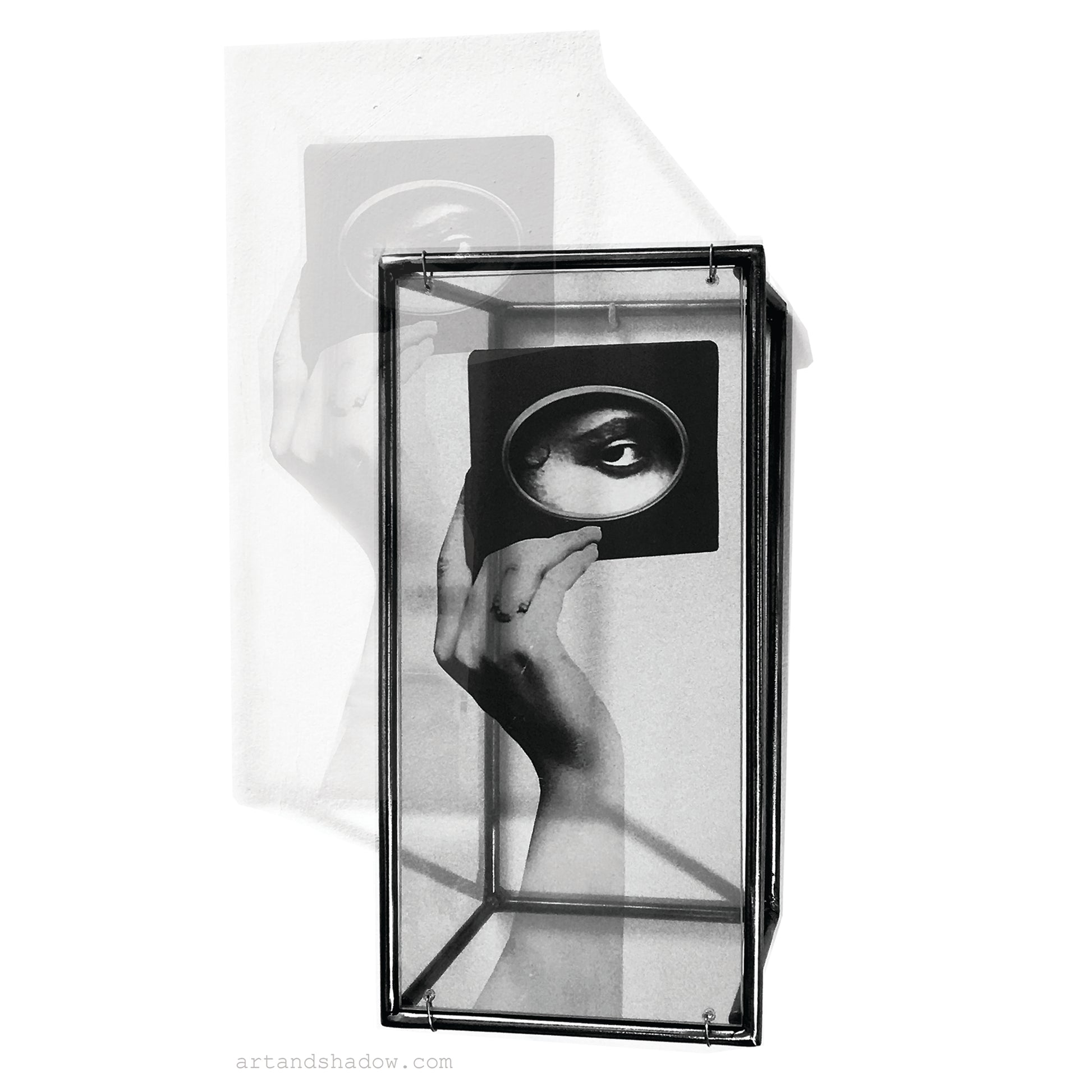 interior wall art, 3d metal art object handmade by art and shadow with an image of surrealist collage. eye and hand
