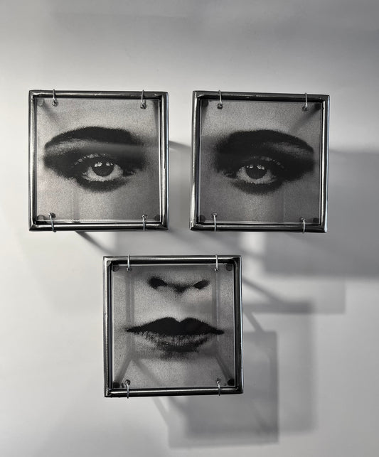 # view projecting from wall of three piece black and white print of female eyes and mouth on transparent acetate mounted in steel frames. Modern Interior Metal Wall Art Sculpture Pop art face - Designer wall art Artandshadowntal