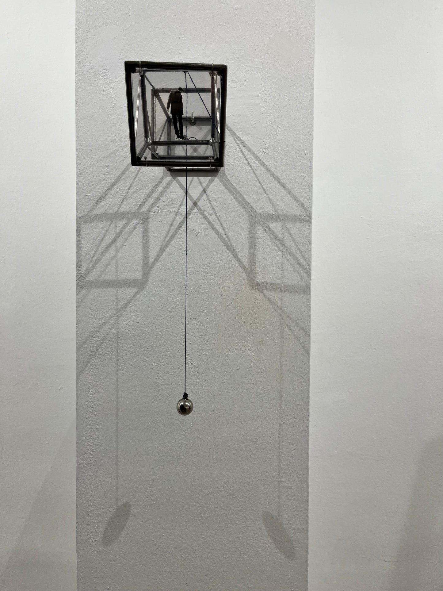 Hanging by a Thread, light and shadow sculpture