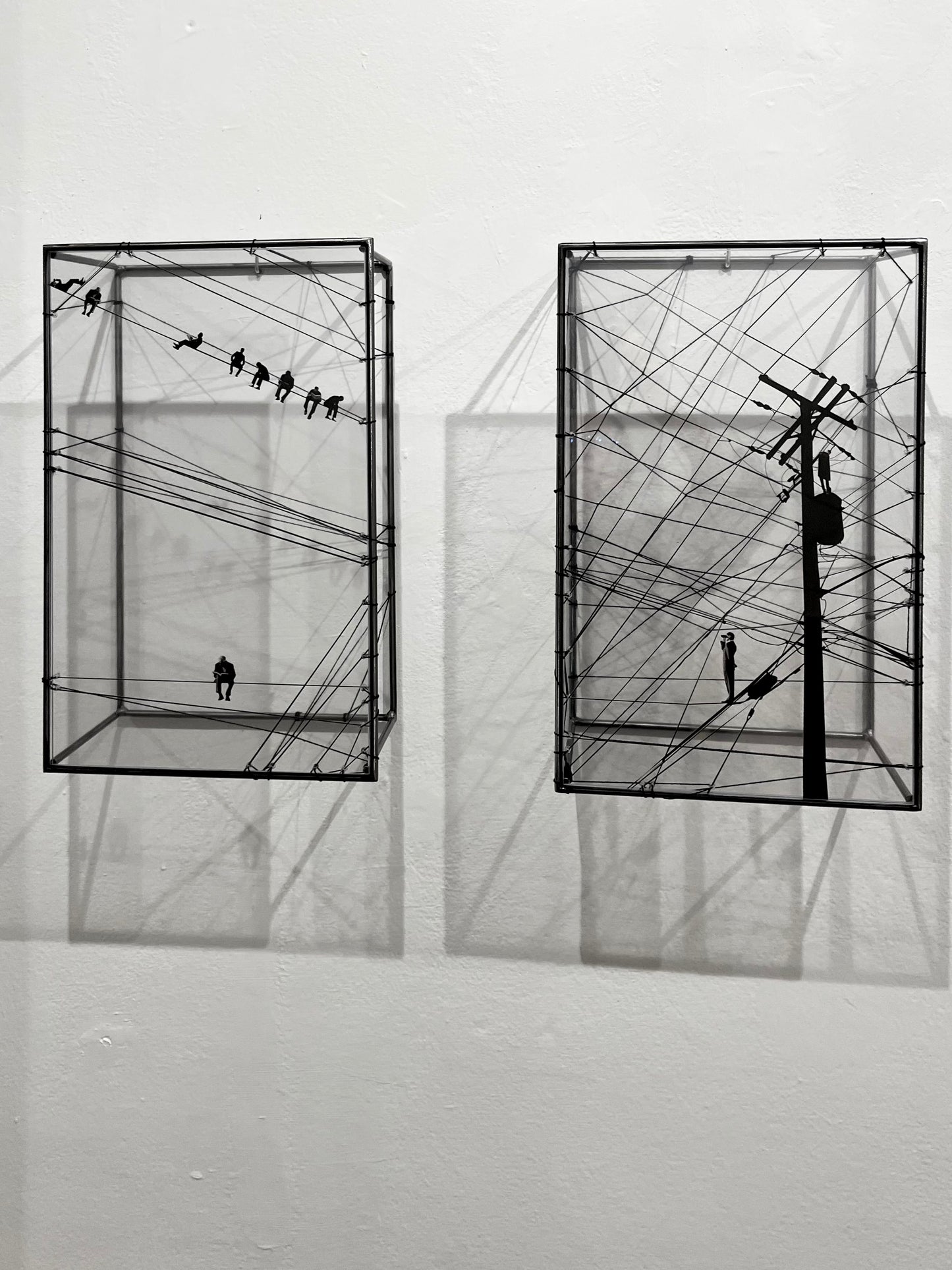 # both elements of two piece wall structure showing shadow effect on white gallery wall. Numbered Limited Edition Wall Sculpture Free Like a Bird: Limited Edition Metal & String Art Diptych Artandshadow