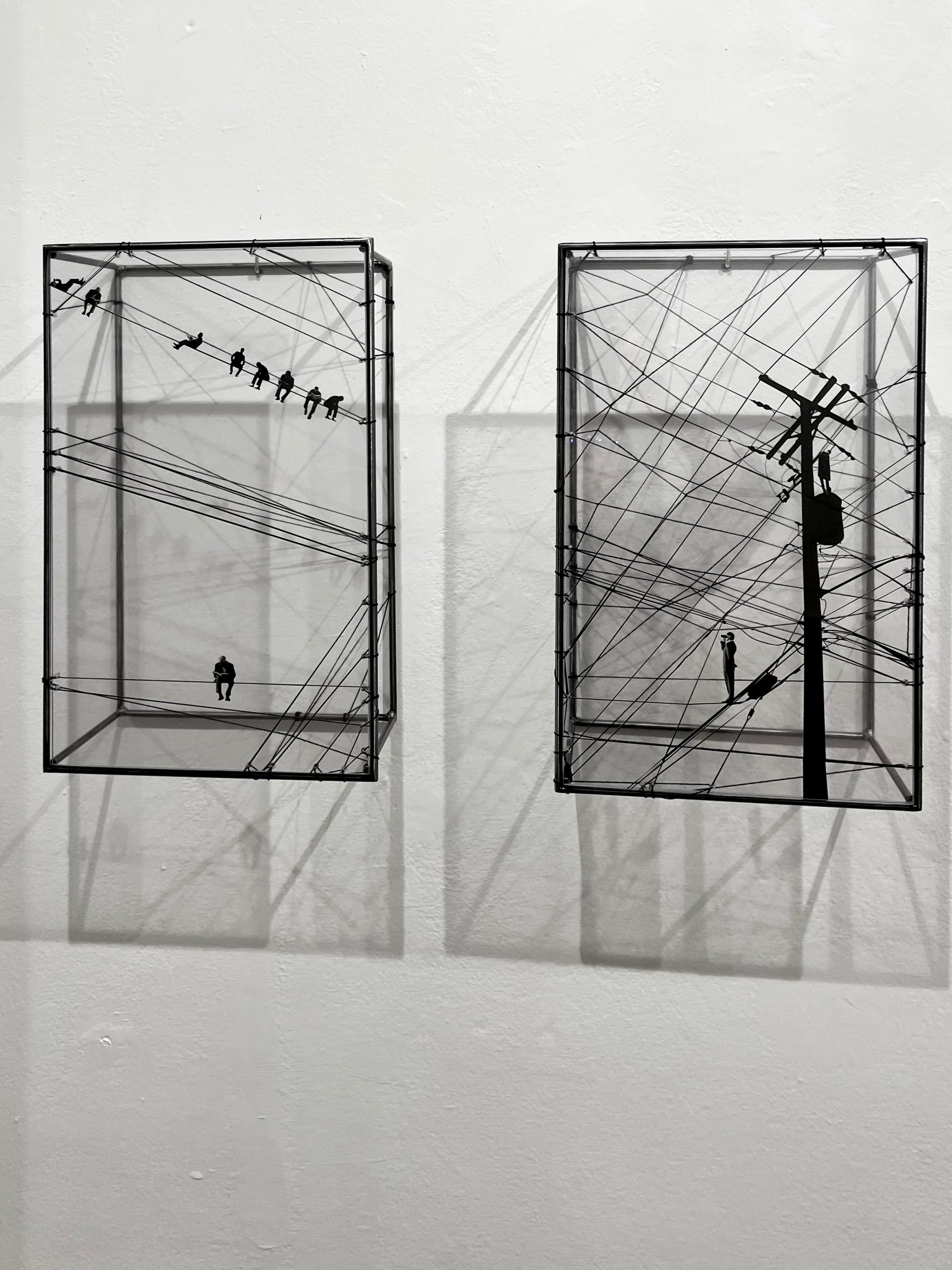 # both elements of two piece wall structure showing shadow effect on white gallery wall. Numbered Limited Edition Wall Sculpture Free Like a Bird: Limited Edition Metal & String Art Diptych Artandshadow