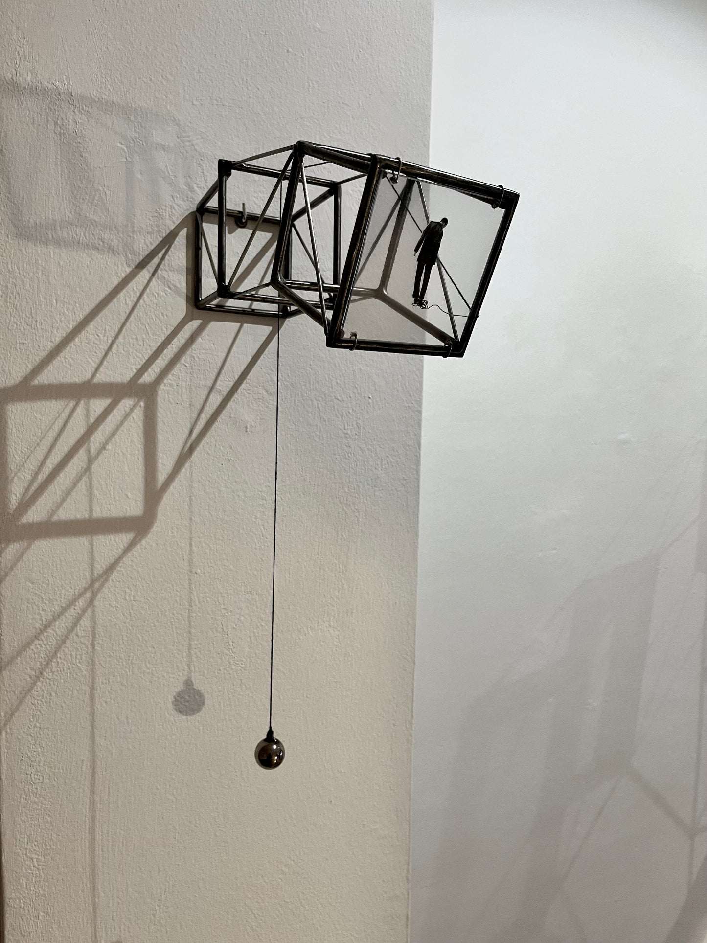 Hanging by a Thread, light and shadow sculpture