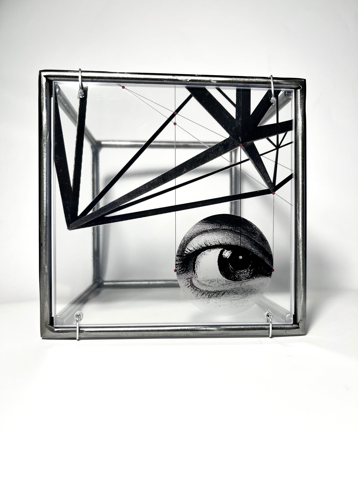 # steel structure with surrealist eye themed collage with white background. Modern Interior Metal Wall Art Sculpture Knowing Glance – Original Shadow Sculpture by Furst_Ori | ArtandShadow Artandshadow