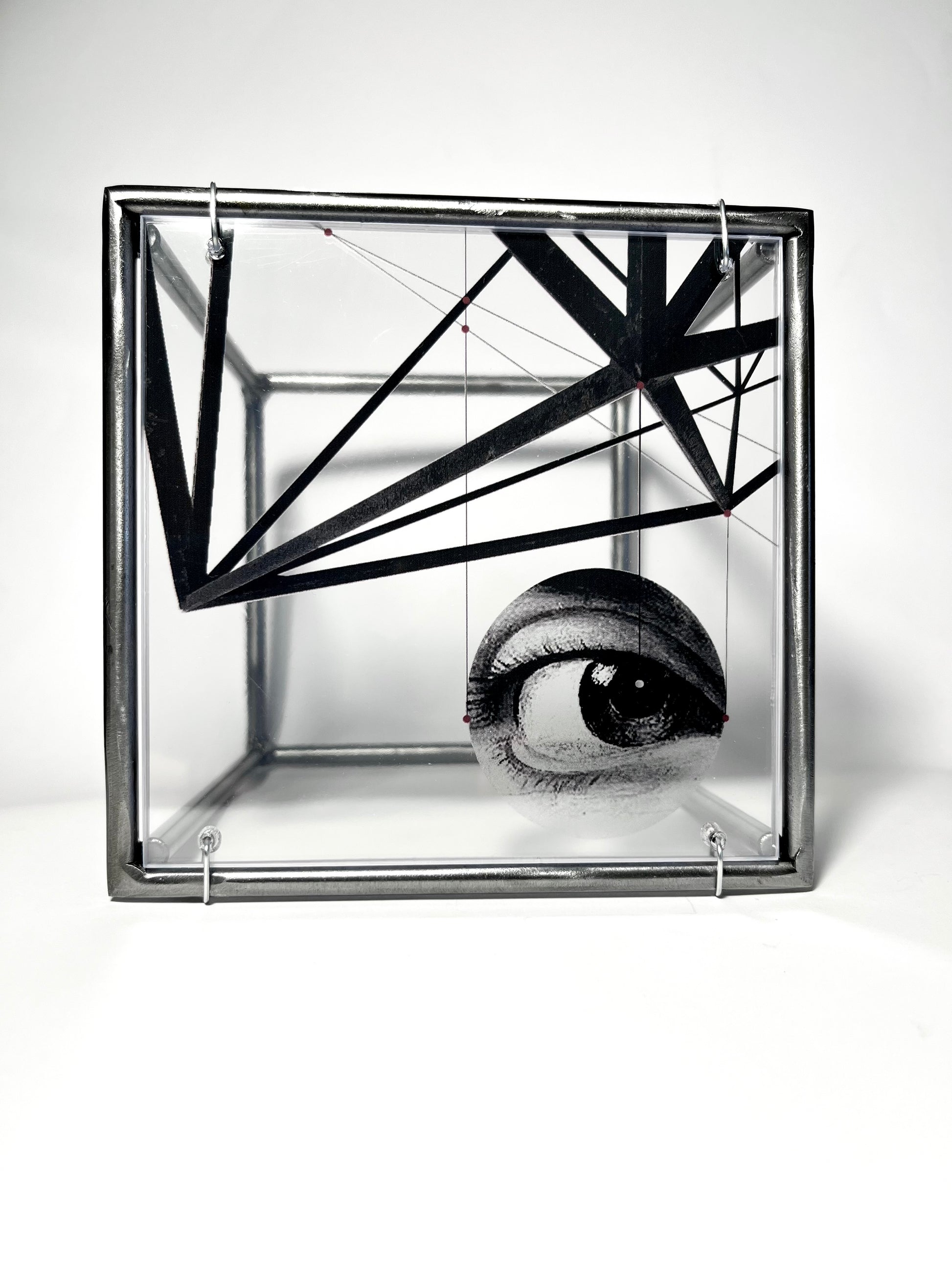 # steel structure with surrealist eye themed collage with white background. Modern Interior Metal Wall Art Sculpture Knowing Glance – Original Shadow Sculpture by Furst_Ori | ArtandShadow Artandshadow