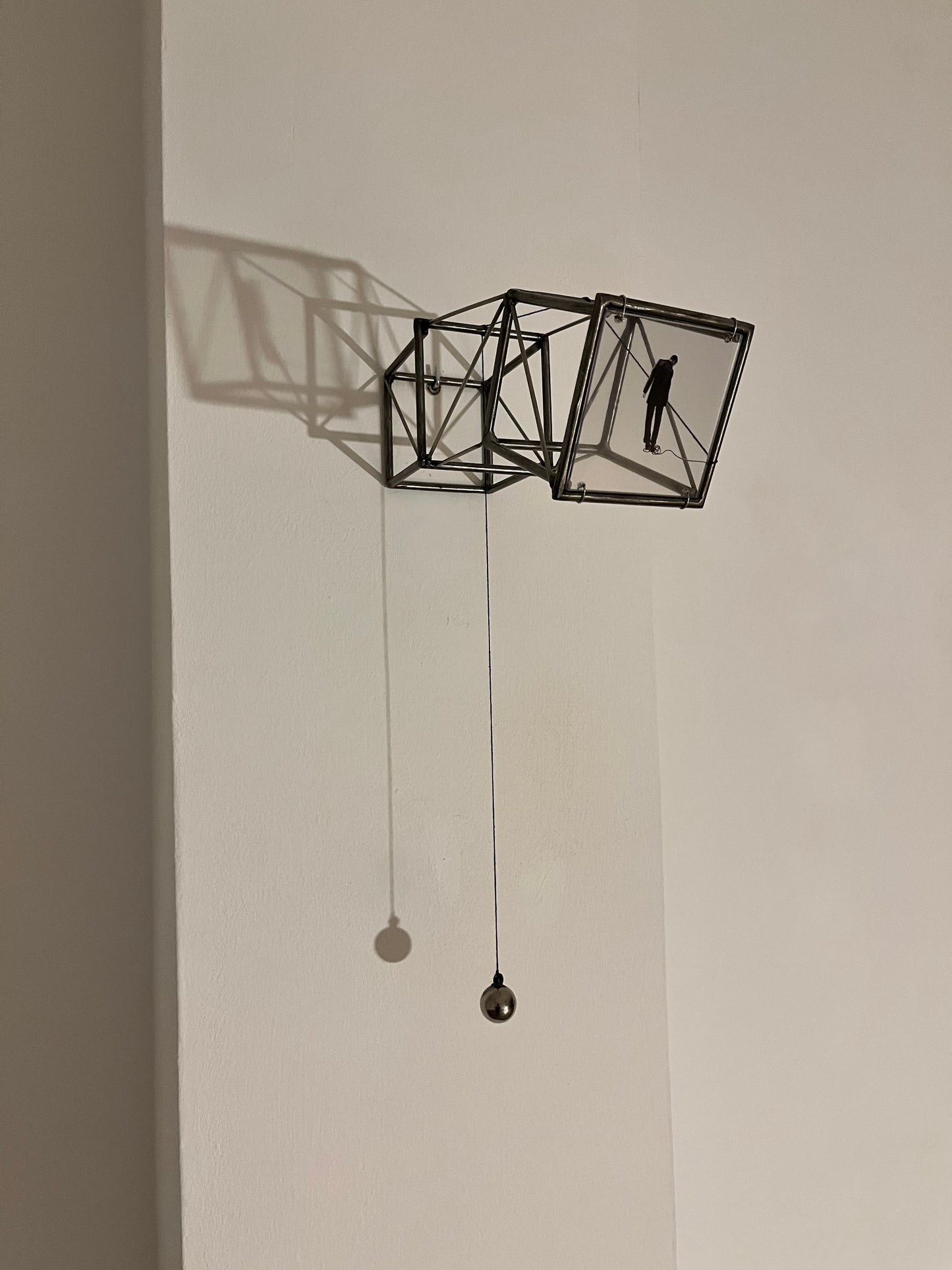 Hanging by a Thread, light and shadow sculpture