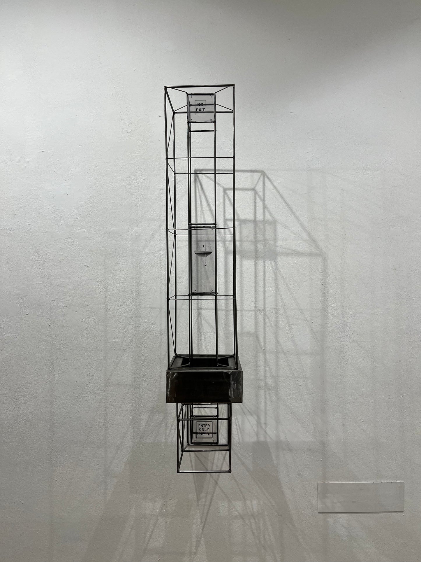 No Exit: steel tower shadow sculpture