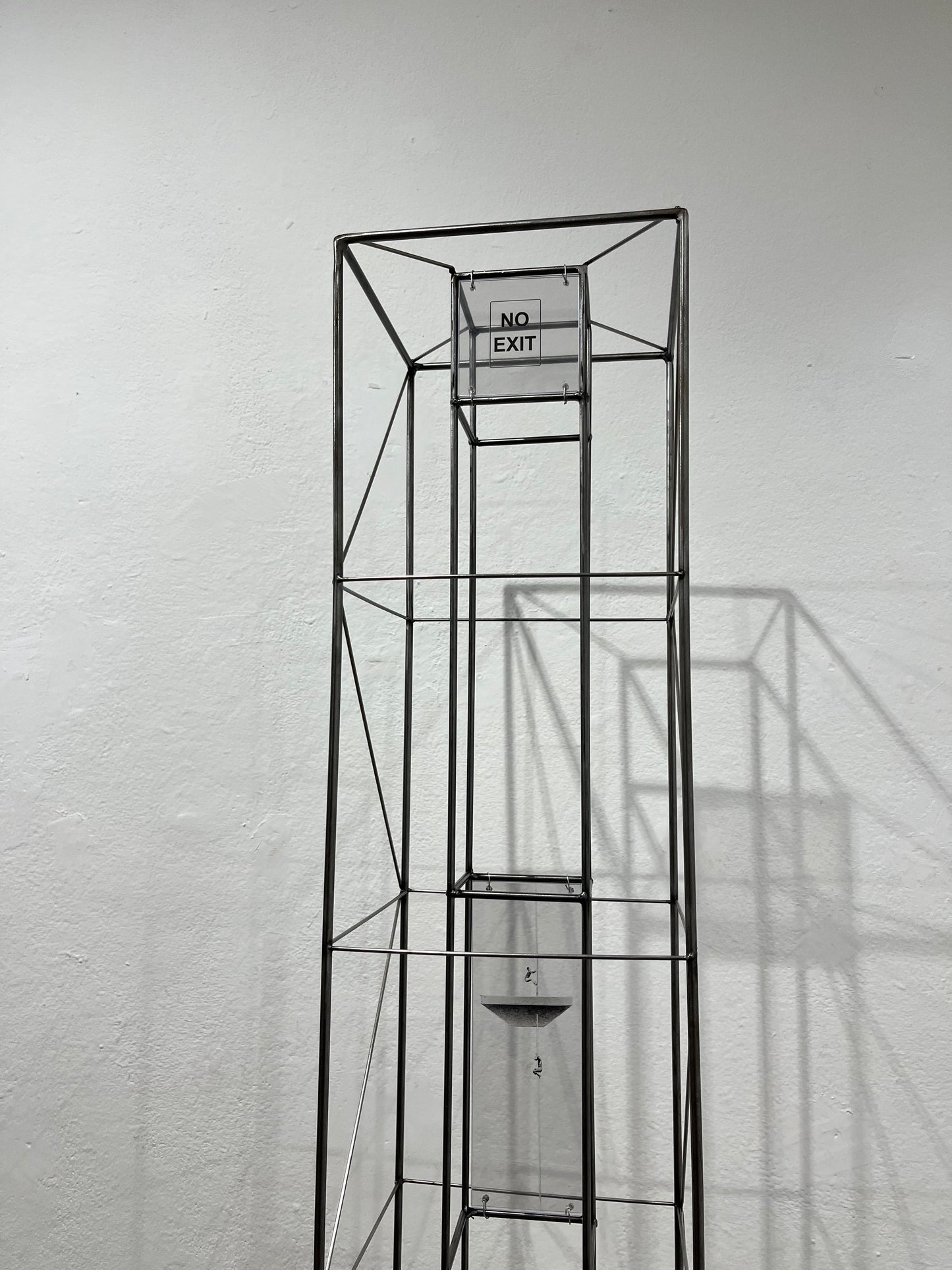 No Exit: steel tower shadow sculpture