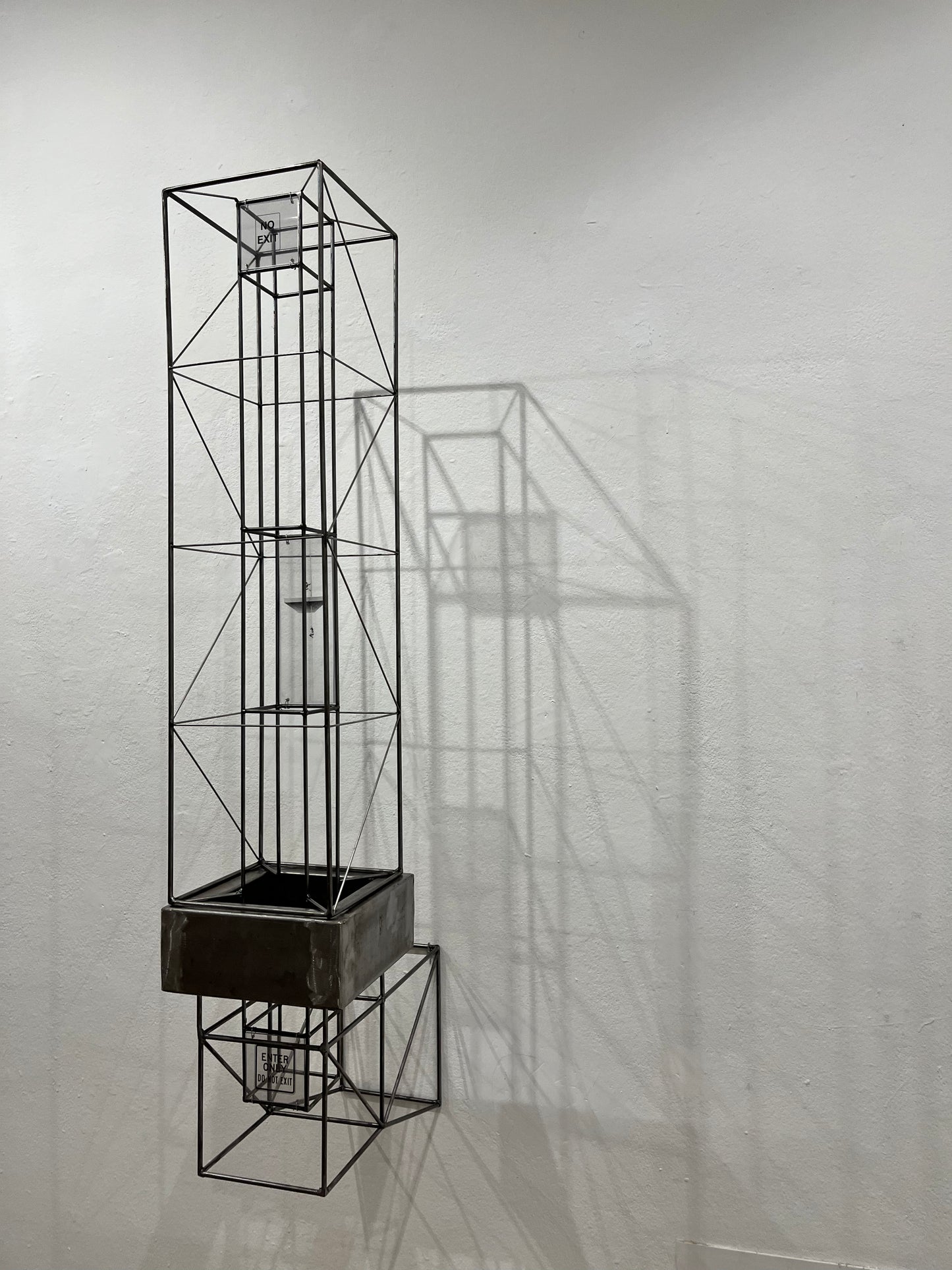 No Exit: steel tower shadow sculpture
