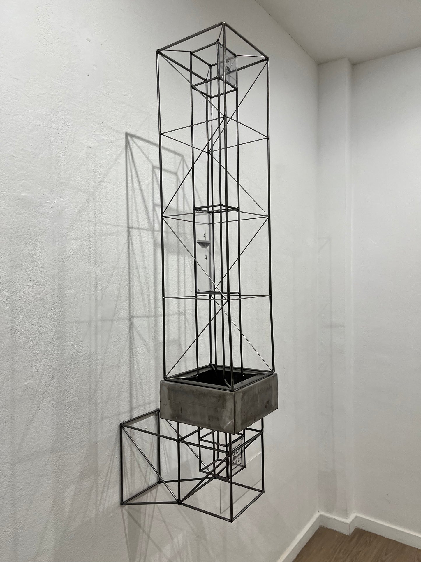 No Exit: steel tower shadow sculpture
