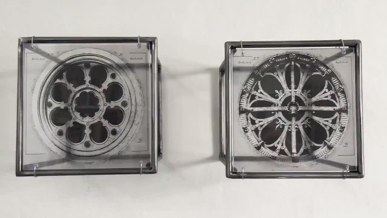 vintage architectural drawings of two French rose windows —  Château de Chantilly and Église Saint-Léonard de Croissy-sur-Seine, printed on transparent acetate housed in steel frame.
