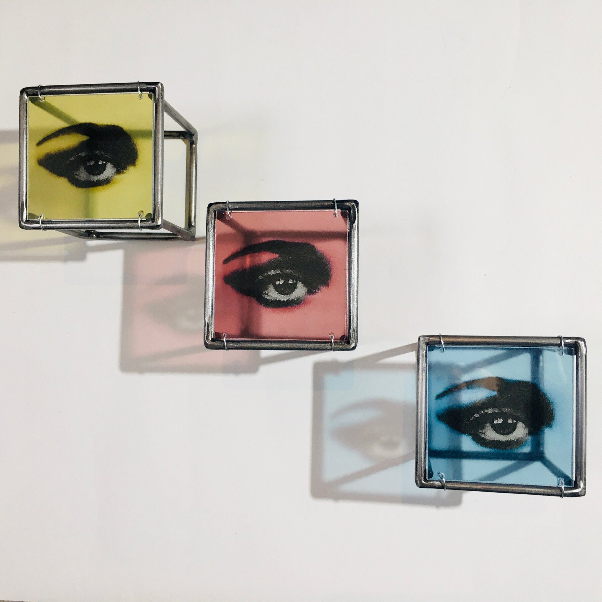 Pop art style, red, blue and yellow eyes. Cubic, metal wall sculpture. Art and shadow, home decor gift. - artandshadow