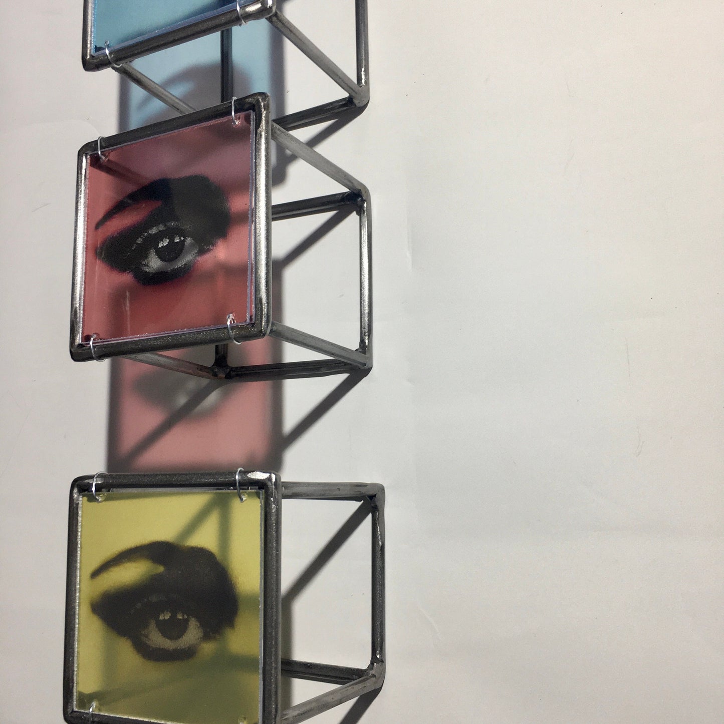 Pop art style, red, blue and yellow eyes. Cubic, metal wall sculpture. Art and shadow, home decor gift. - artandshadow